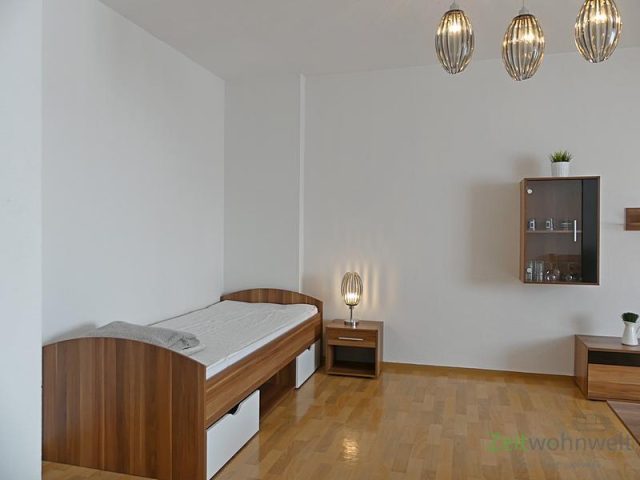 Bett imm Wohnzimmer