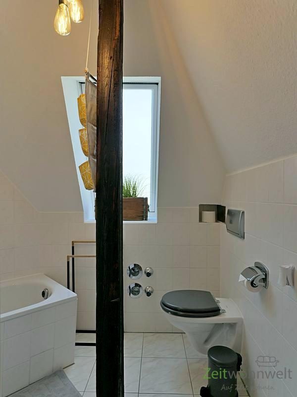 Holzbalken im Bad