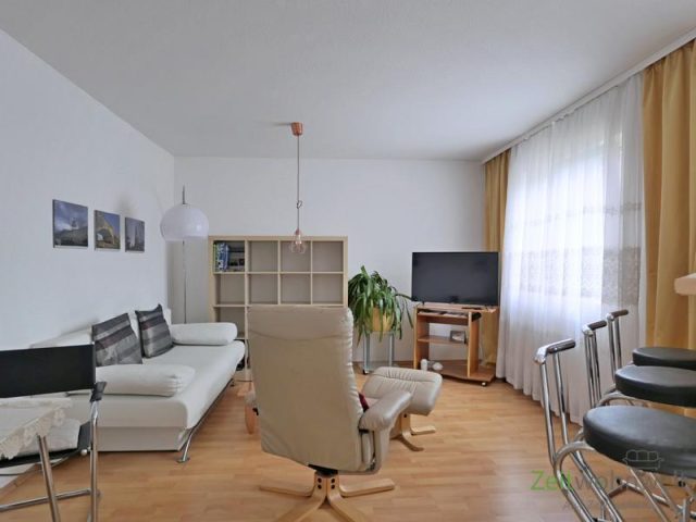 Wohnzimmer, Couch, Sessel, TV